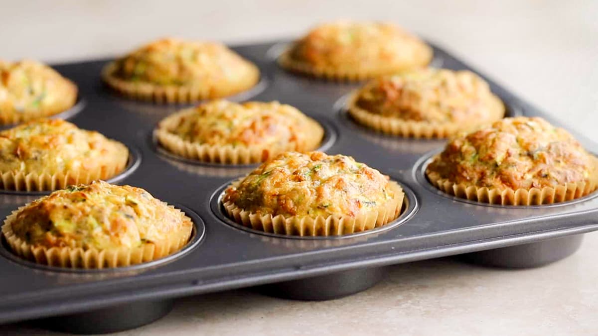 Cool the zucchini muffins before storing them in the fridge