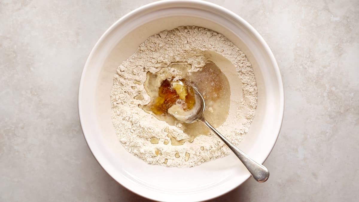 Clean protein bar ingredients in a bowl ready to mix