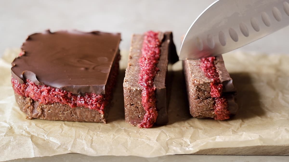 Chocolate raspberry chia slice cut into squares