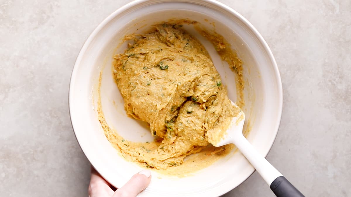 Fold the oat flour mixture into the wet ingredients for the muffins