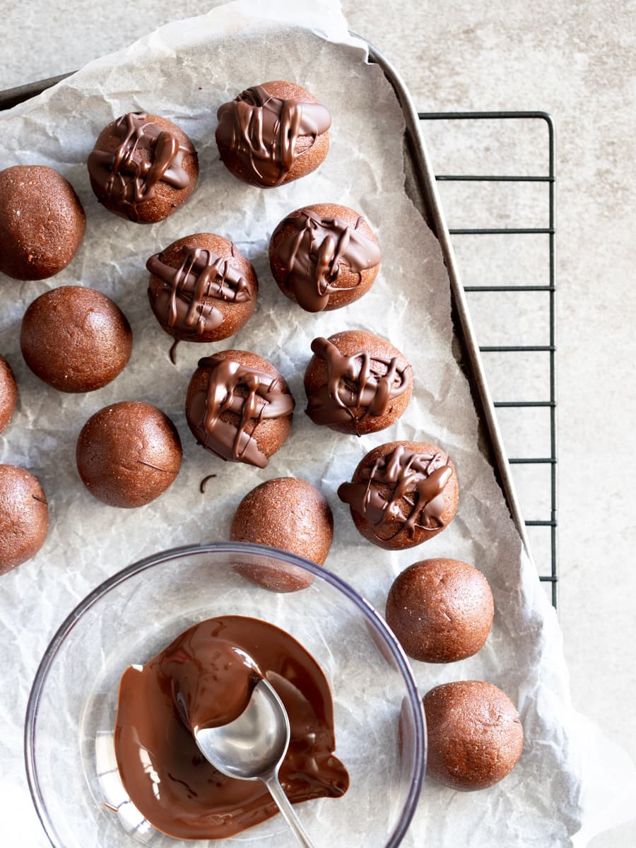 Choc Mint Whey Protein Balls drizzled with melted chocolate