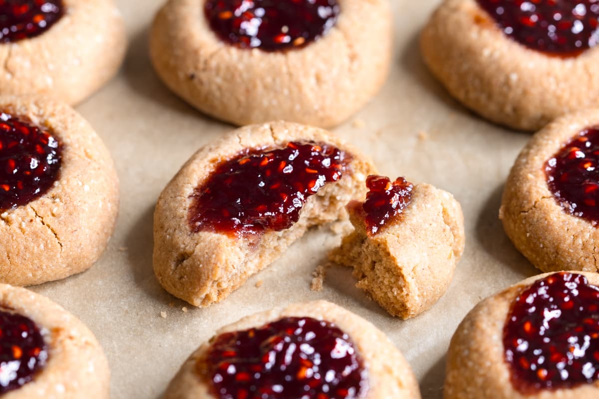 Bite taken out of a Buckwheat Jam Thumbprint Cookie