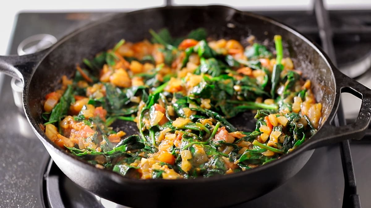 Stir fresh spinach through the shakshuka