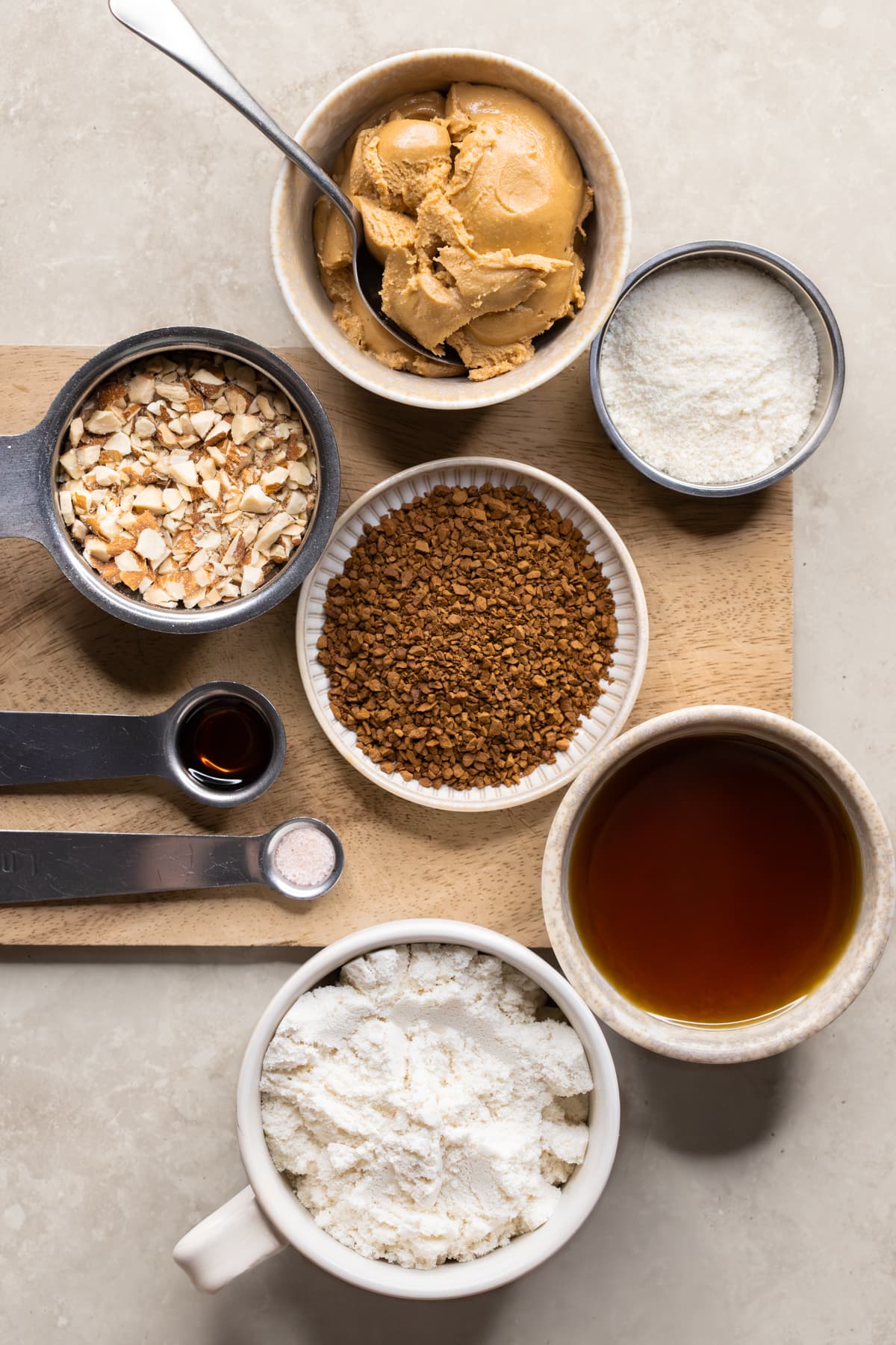 Ingredients for protein balls on a wooden board