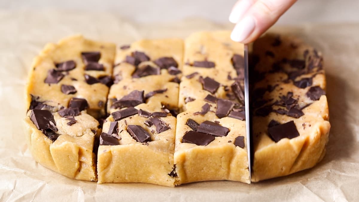 Cookie dough protein bars cut into individual bars on a flat surface