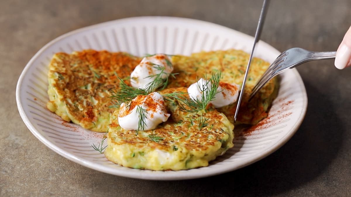 Gluten-free zucchini fritters served on a plate