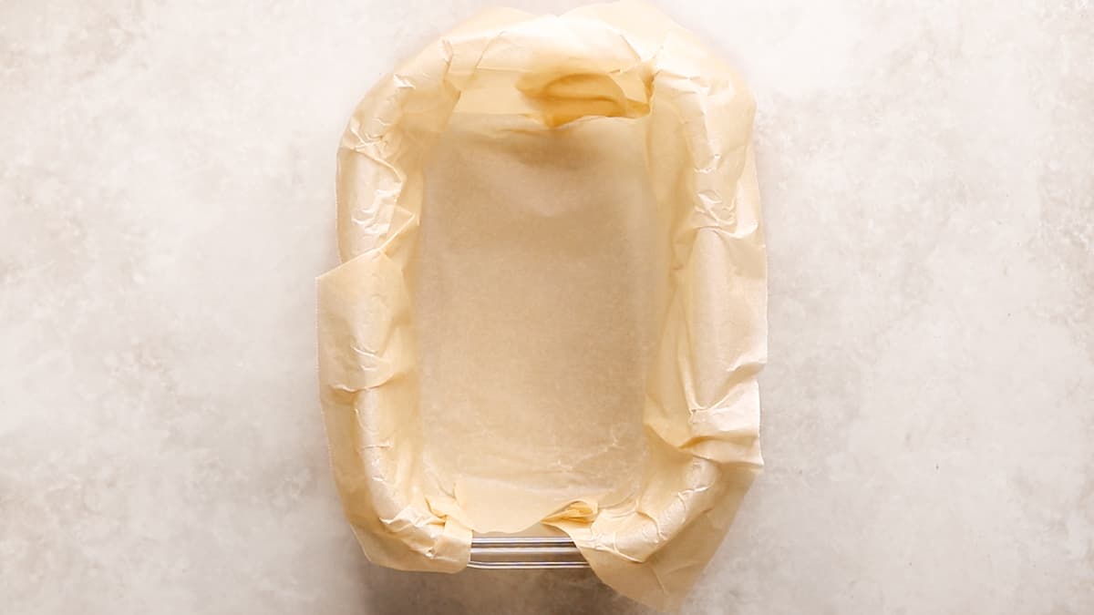 Lined container with baking paper ready for filling