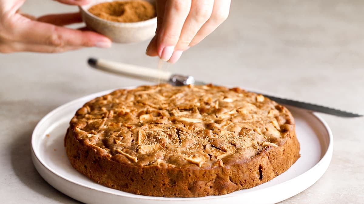 Sprinkle the gluten-free apple cake with extra coconut sugar before serving