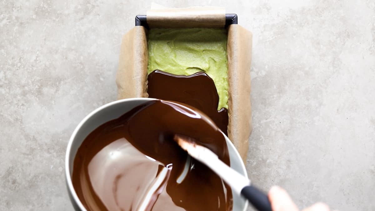 Pour the chocolate topping over the mint filling