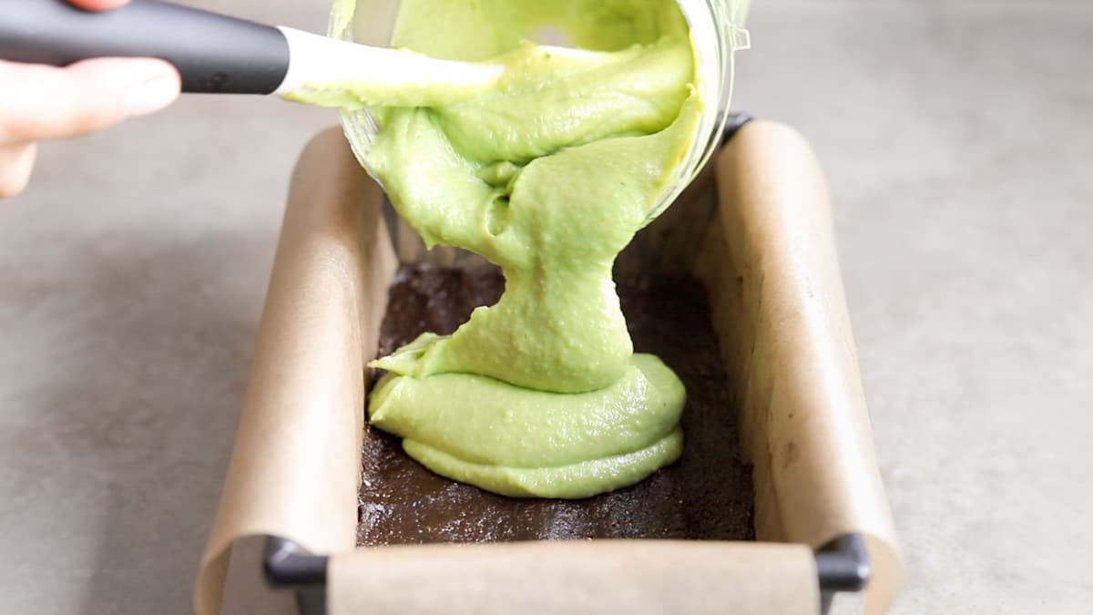 Pour the mint filling over the chocolate biscuit base
