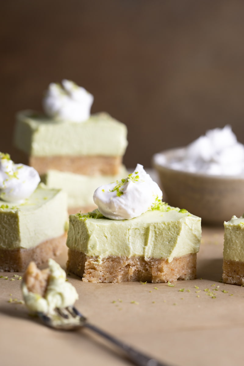 No Bake Vegan Lime Cheesecake with a bite taken out