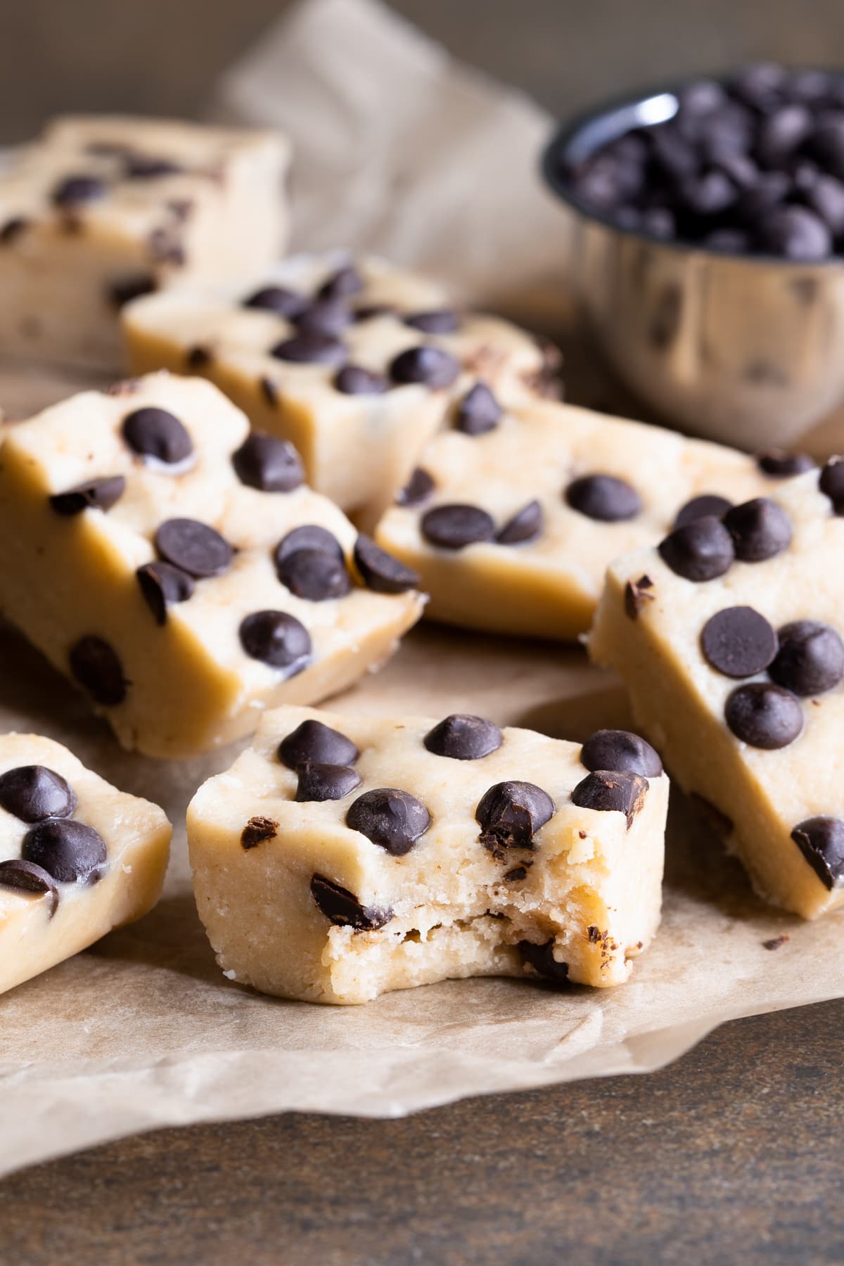 Nut Free Cookie Dough Protein Bars with a bite taken out of one bar