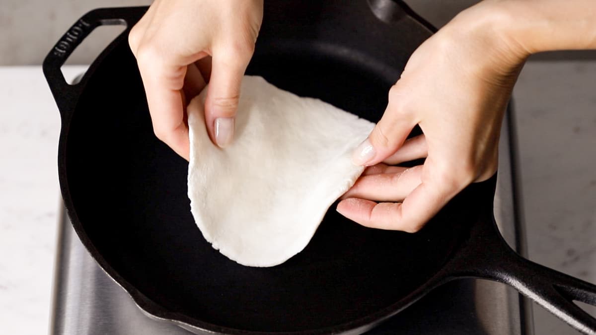 Fry the gluten-free flatbread in a skillet without oil