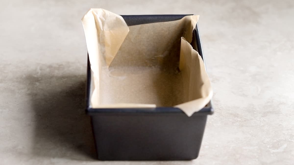 Loaf pan lined with baking paper