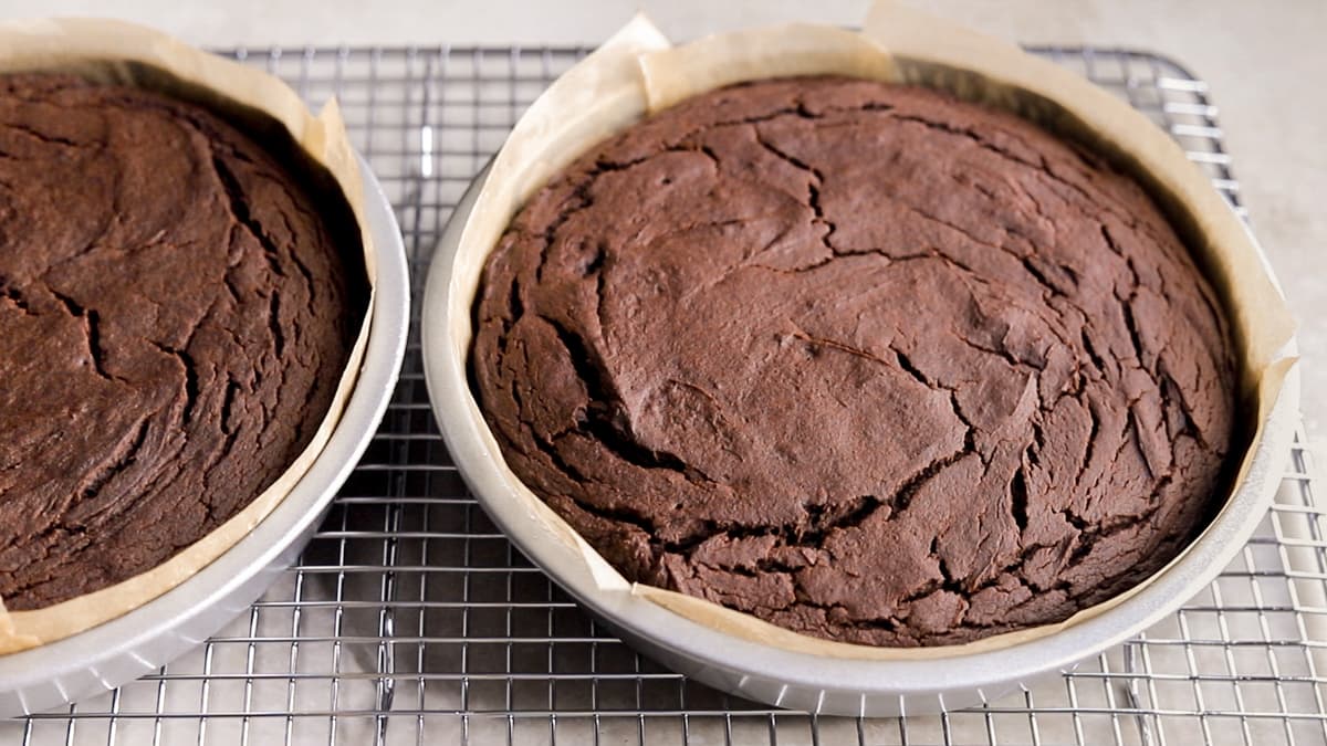 Vegan sweet potato chocolate fudge cakes freshly baked in round tins