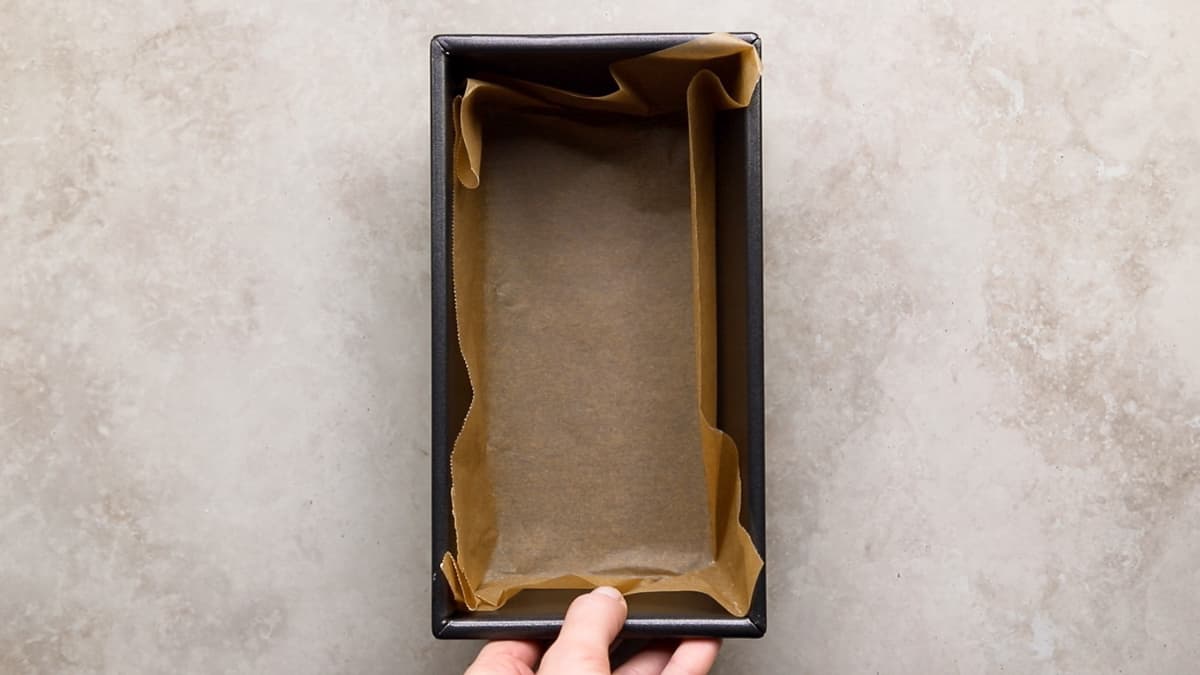Line a loaf tin with baking paper