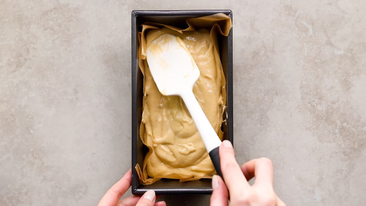 Transfer the buckwheat bread batter into a lined loaf tin