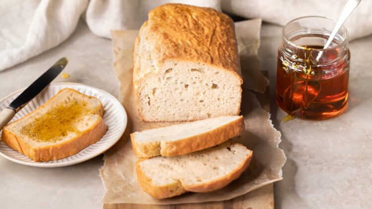 Gluten-free bread sliced on a wooden board