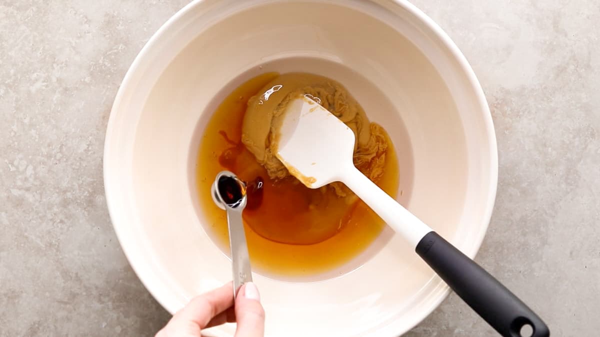 Peanut butter, brown rice syrup, and coconut oil in a bowl