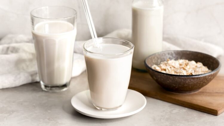 Homemade oat milk served in a glass