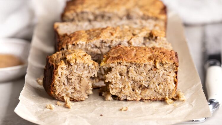Banana cinnamon baked oatmeal protein bars with one bar split in half
