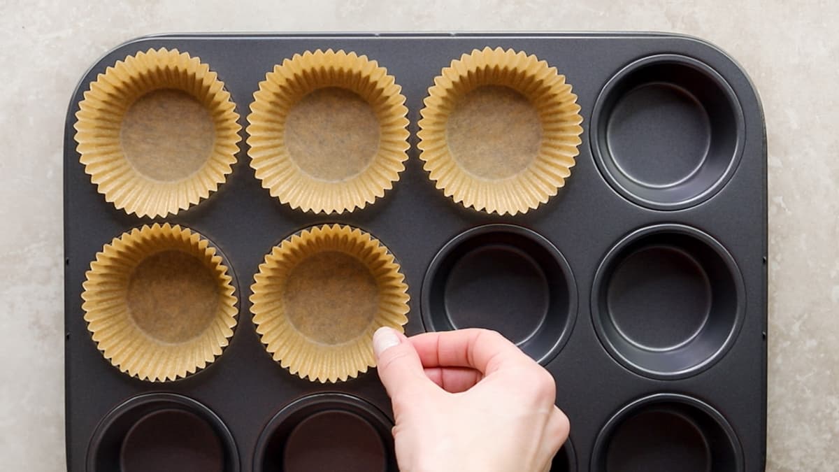Muffin tray filled with paper cases