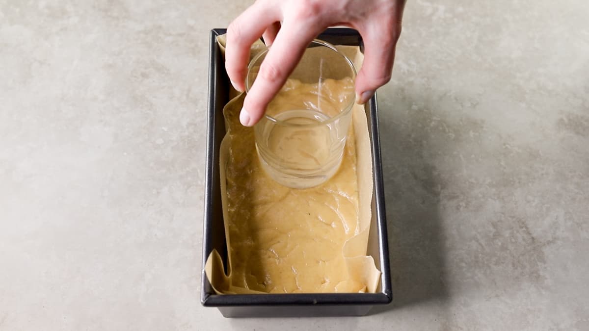 Press the peanut butter protein slice mixture into the loaf tin