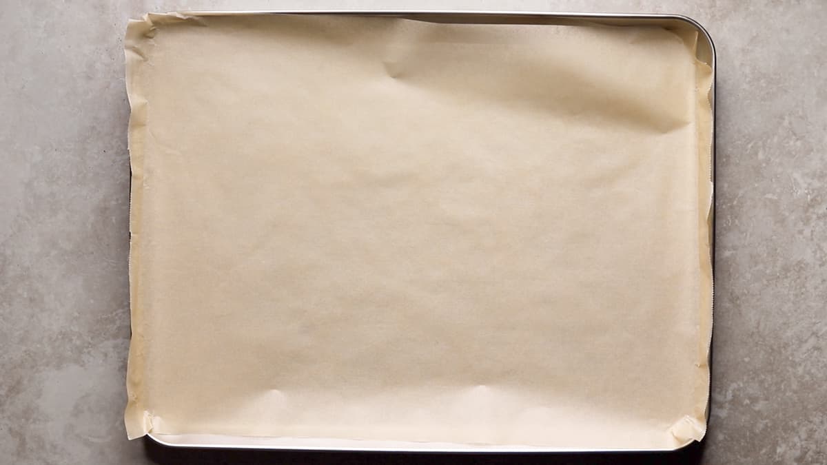 Line a large baking sheet with parchment paper