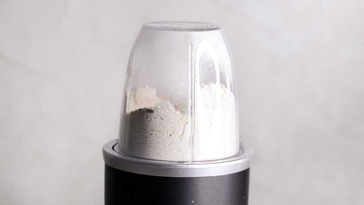 Blend rolled oats in a blender to a flour consistency