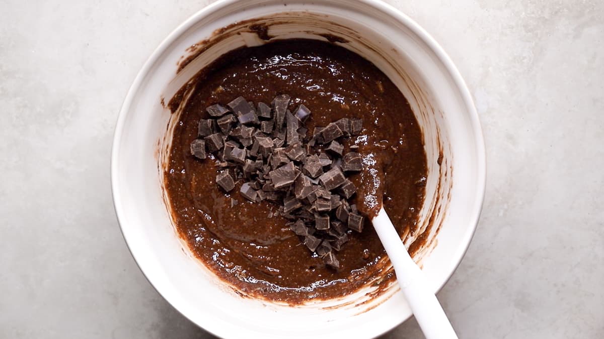 Fold through the dry ingredients and chopped chocolate for the zucchini bread batter