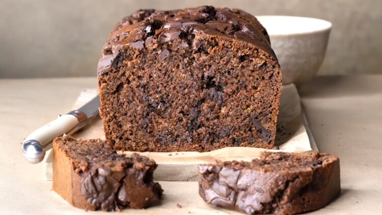 A loaf of gluten-free chocolate zucchini bread with chocolate chips