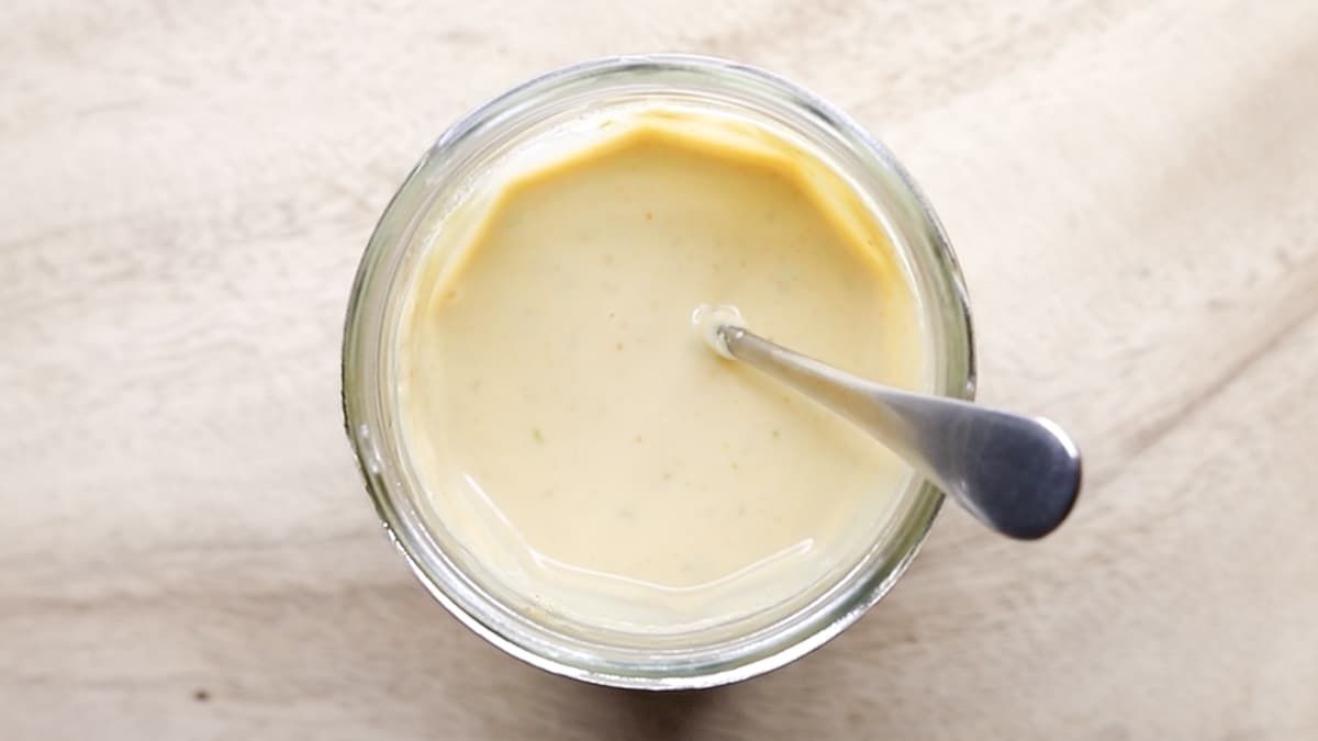 Thin the cashew lime dressing with water for consistency
