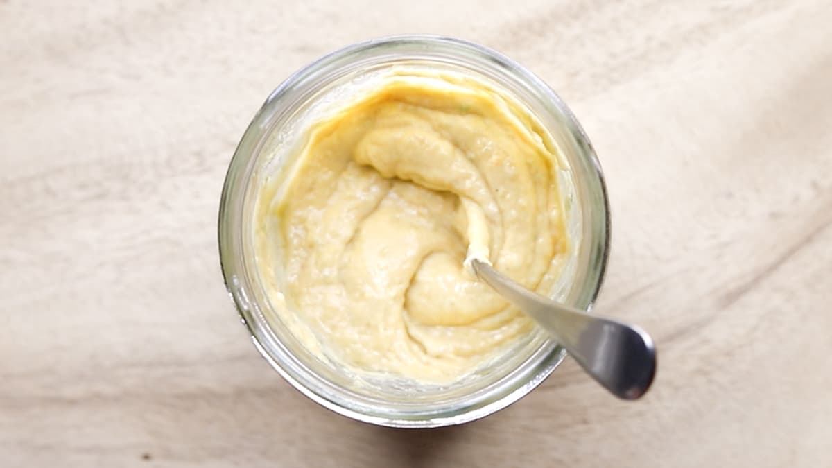 Stir the cashew lime dressing until smooth