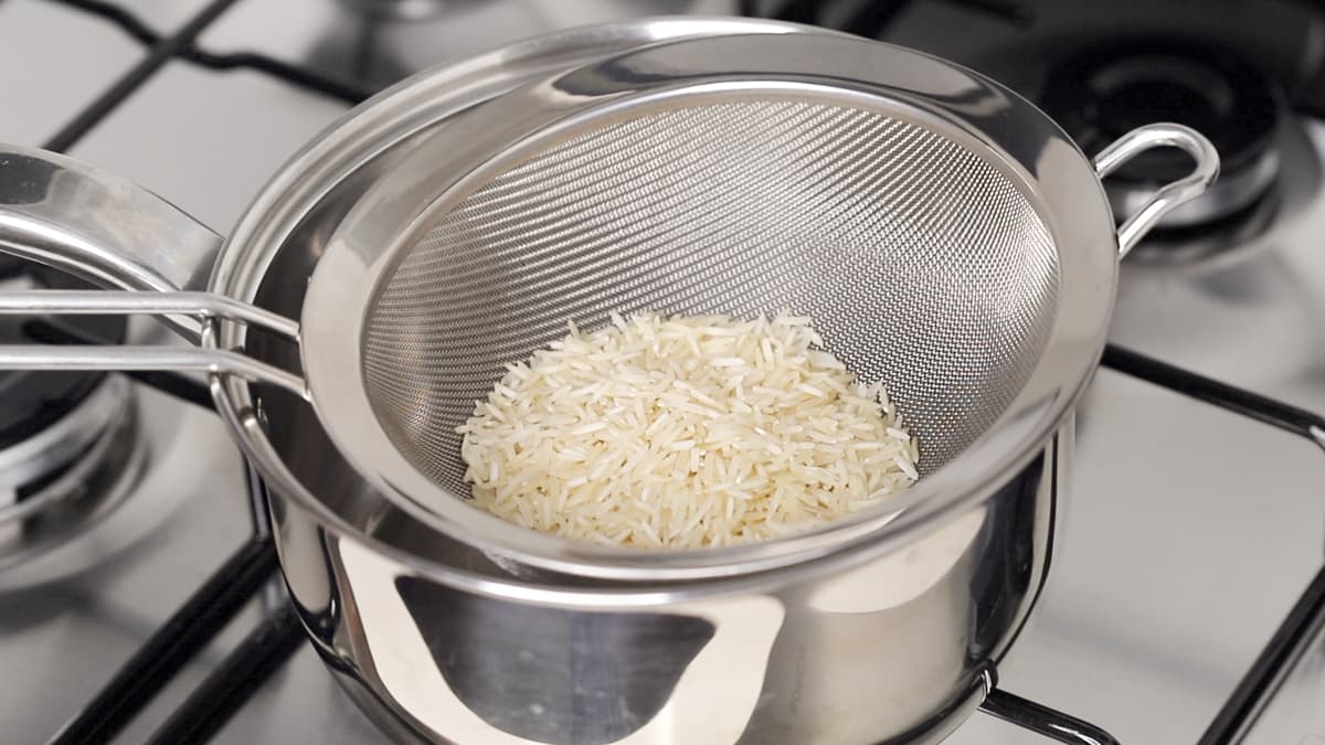Rinse the rice before boiling in water
