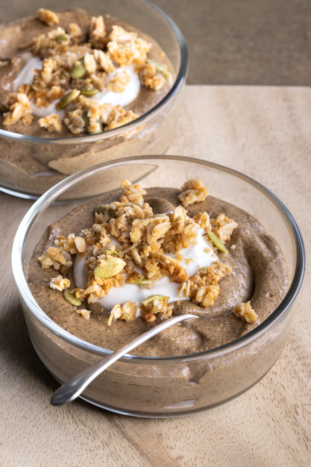 Blended chia pudding served in a bowl with yogurt and granola