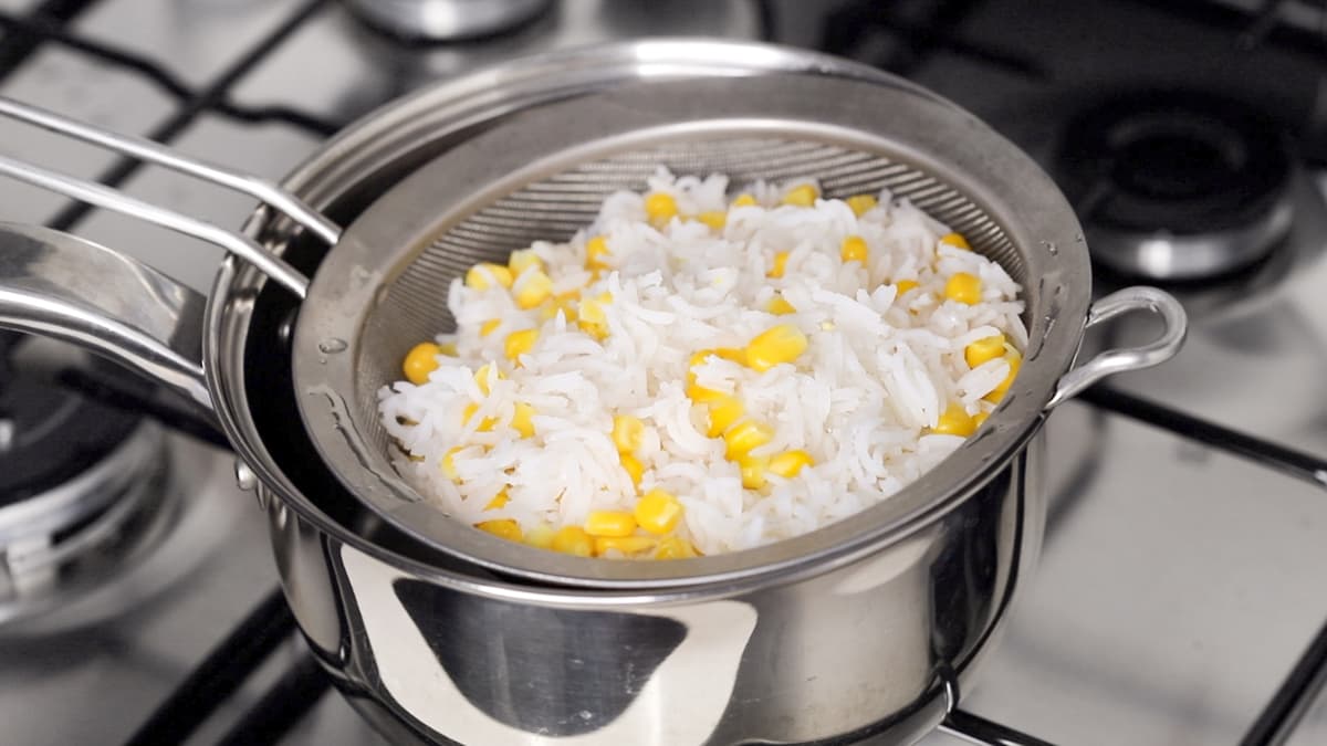 Allow the cooked rice and corn to cool before adding to the salad