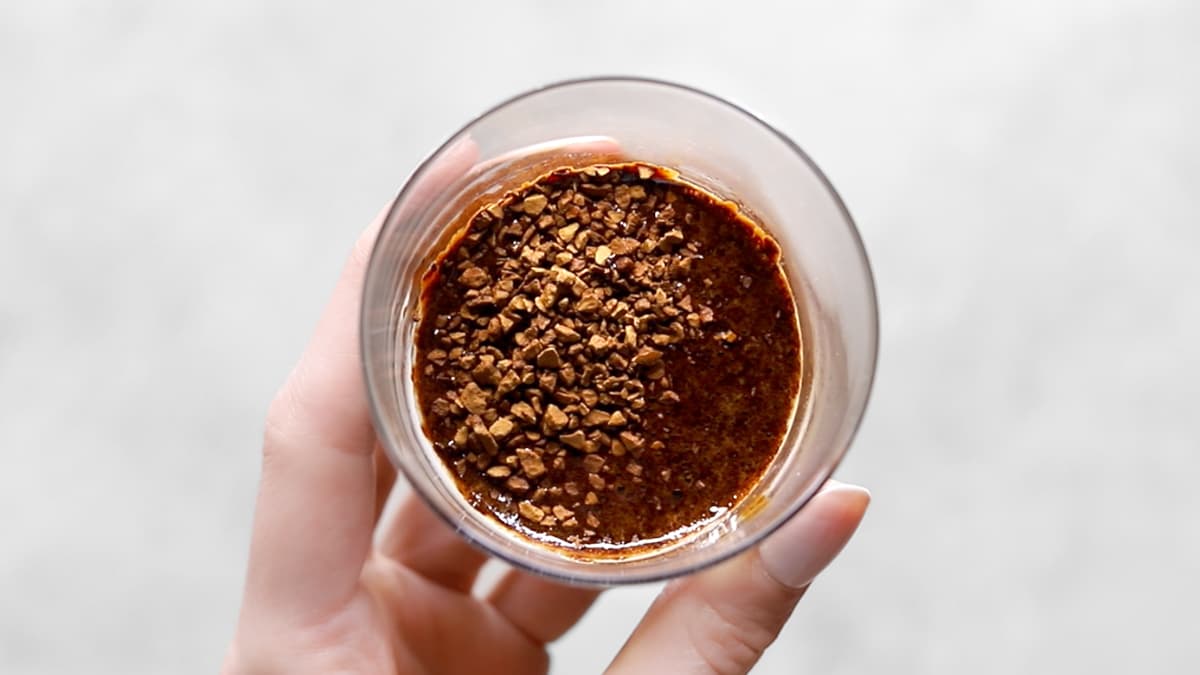 Dissolve instant coffee in a small amount of hot water