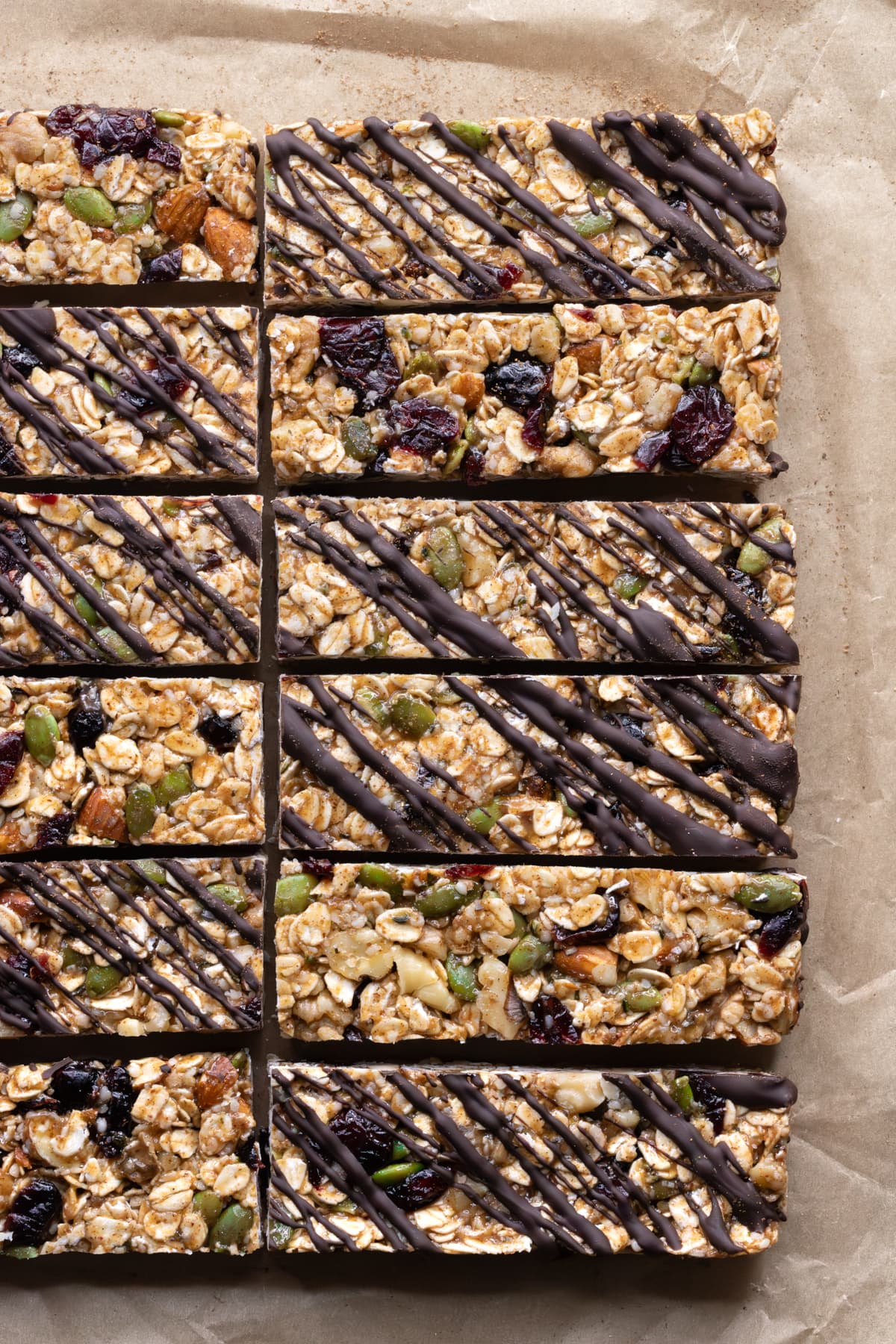 Homemade chewy granola bars with chocolate drizzle
