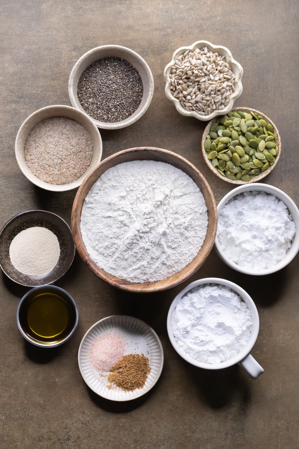 Ingredients for gluten-free buckwheat bread arranged in bowls