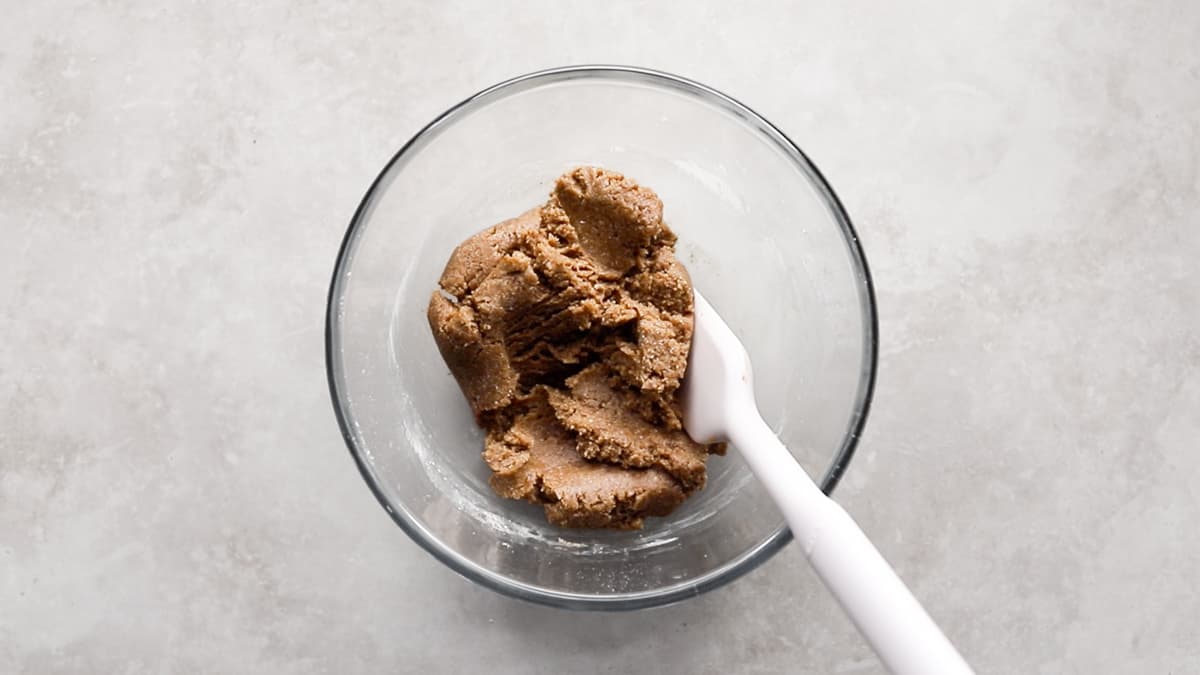 Almond butter filling for Easter eggs mixed in a bowl with a spatula