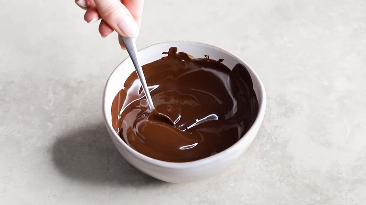 Melted chocolate being mixed in a bowl