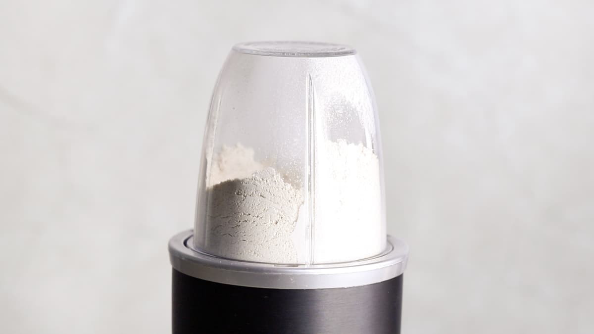 Rolled oats blended into a fine, flour-like consistency in a blender