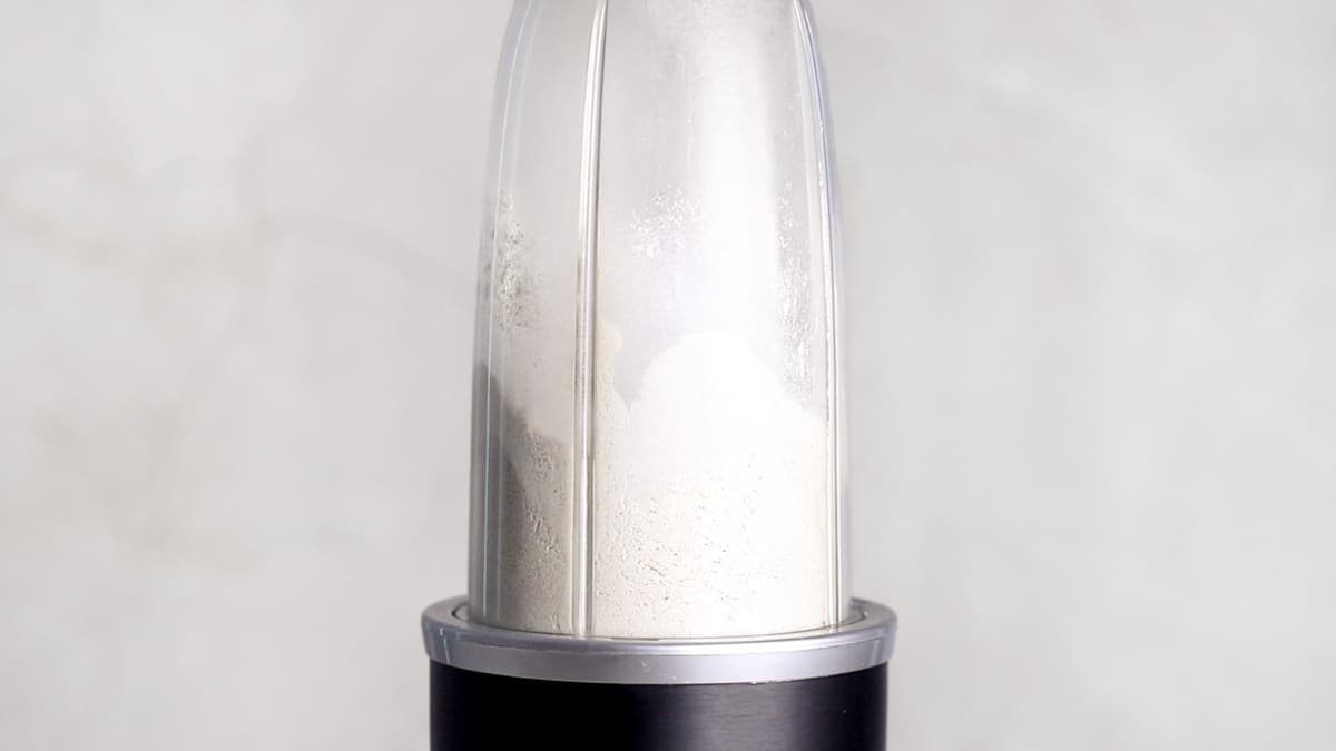 Oats processed into a fine flour-like consistency in a blender