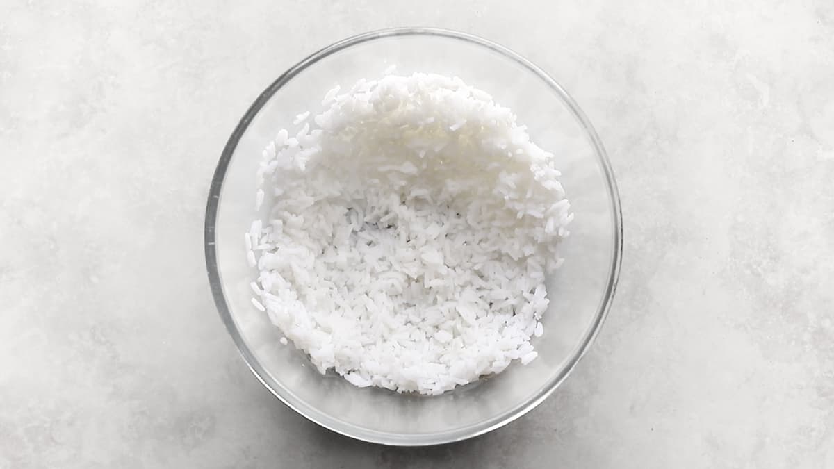 Cooked white rice cooling in a bowl after cooking