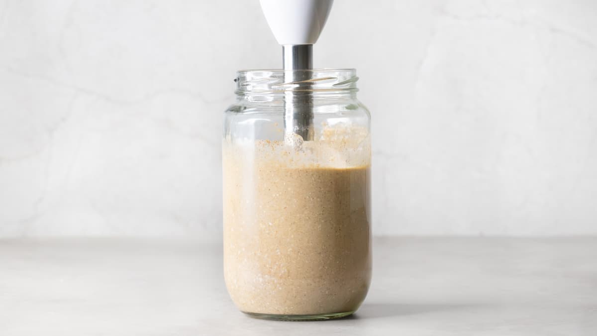 Banana cottage cheese pancake batter in a jar with a hand blender